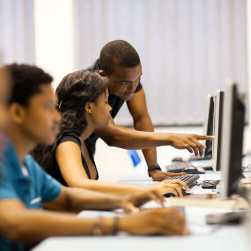 african american college students in computer room